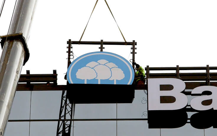 Installing Signage on Bell Bank high-rise in Bloomington MN