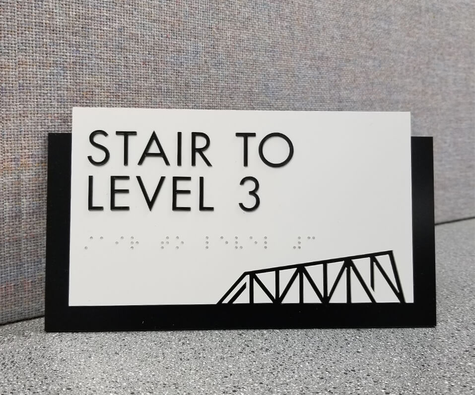 Cantilever Distillery and Hotel ADA Signage stair to Level 3 with bridge accent