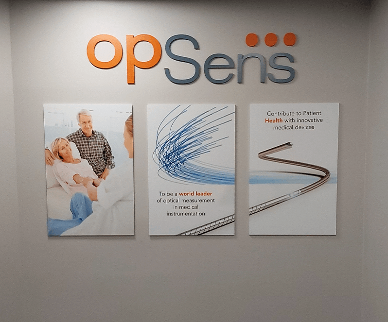 opSens Interior Logo with interior printed signs on wall